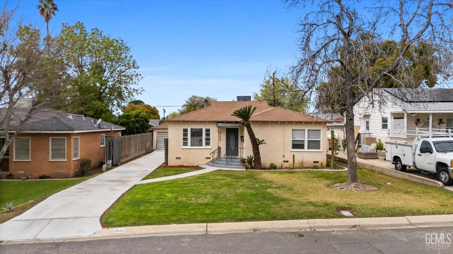 Undisclosed Address Bakersfield, CA 93305 - Photo 3 of 46 front view of a house with a patio