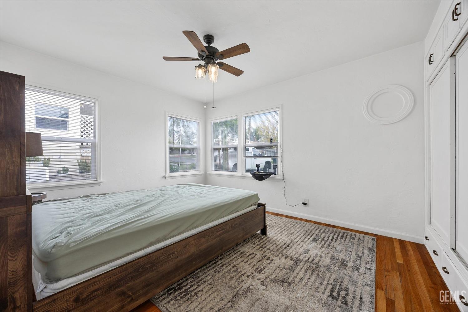 Undisclosed Address Bakersfield, CA 93305 - Photo 32 of 46 a bedroom with a bed and window