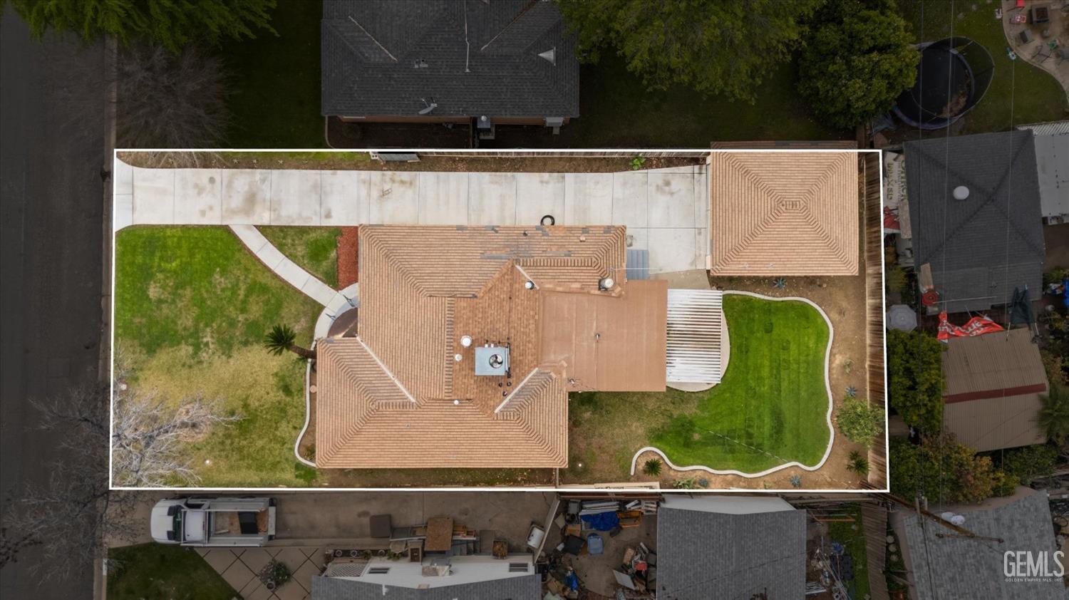 Undisclosed Address Bakersfield, CA 93305 - Photo 41 of 46 an aerial view of a house with a swimming pool