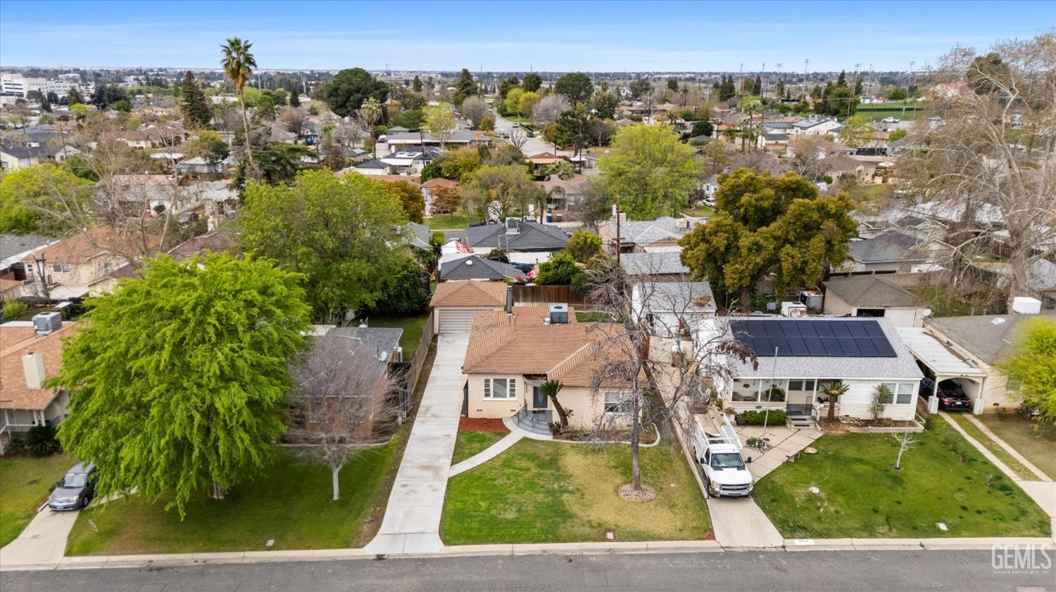 Undisclosed Address Bakersfield, CA 93305 - Photo 5 of 46 an aerial view of residential houses with outdoor space and parking