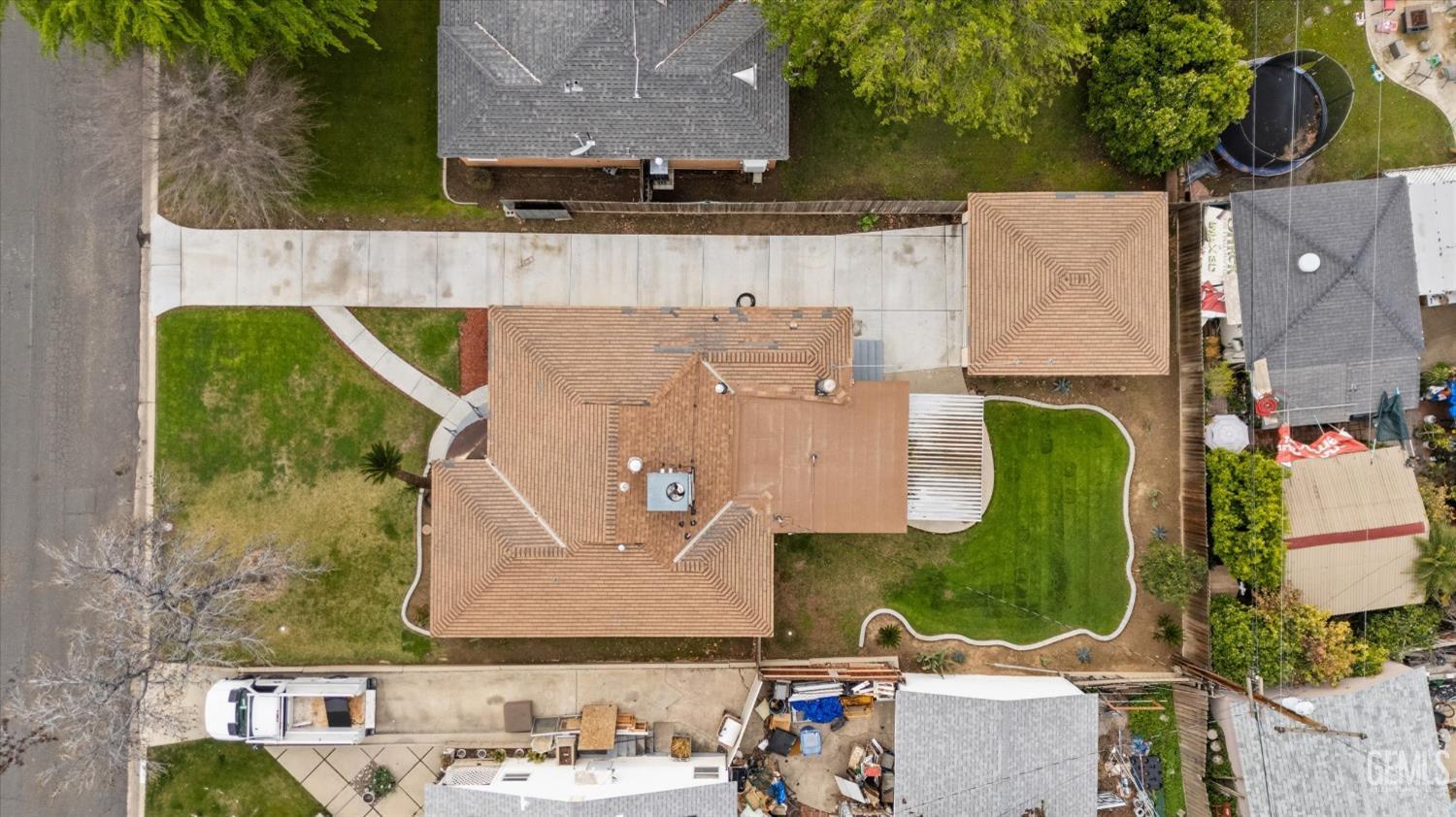 Undisclosed Address Bakersfield, CA 93305 - Photo 6 of 46 an aerial view of a house with a garden