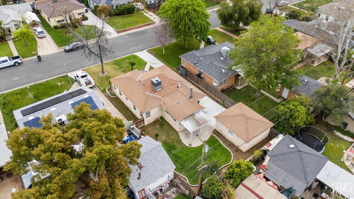 Undisclosed Address Bakersfield, CA 93305 - Photo 7 of 46 an aerial view of a house with a yard