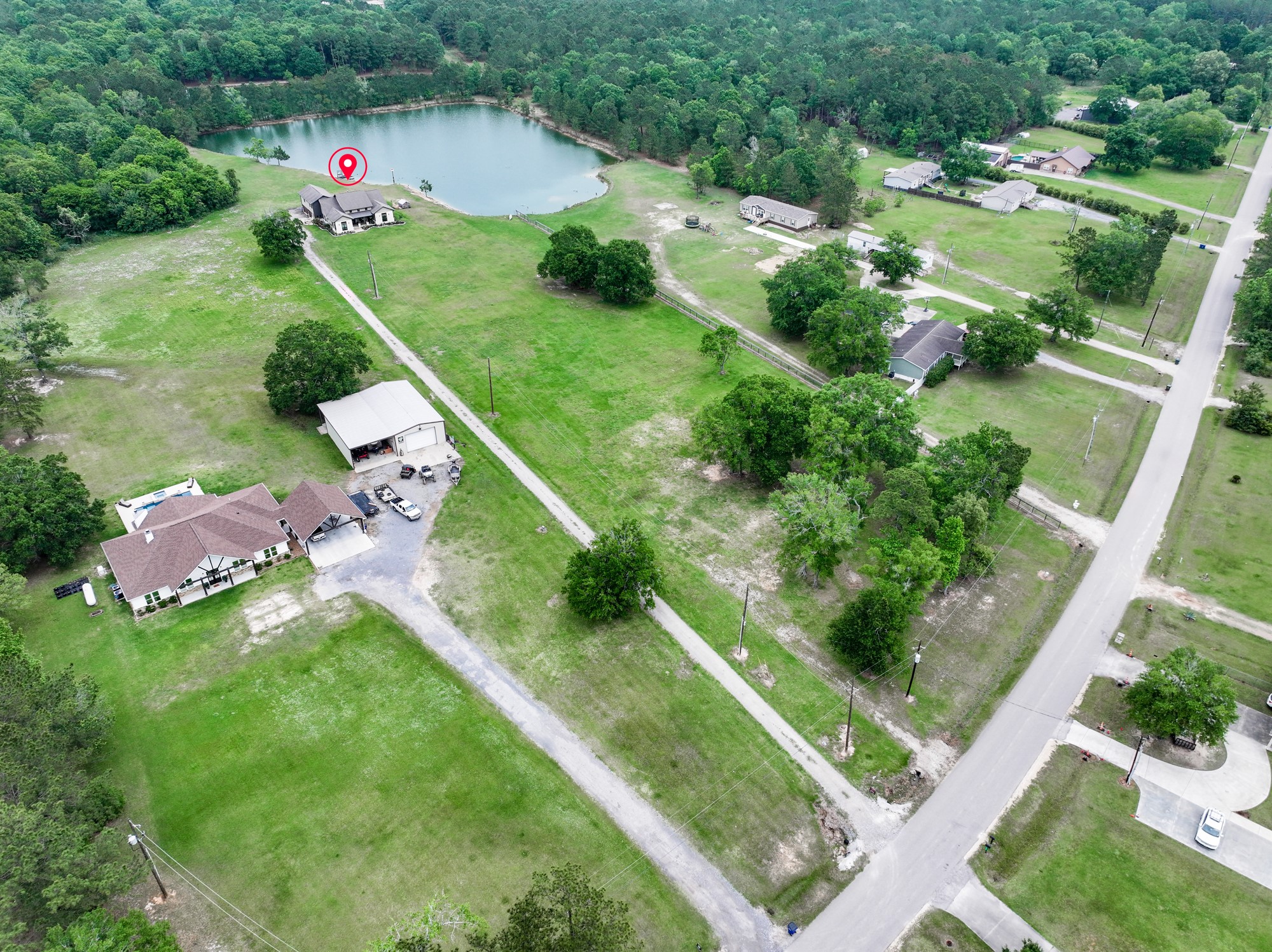 10573 Cooks Lake Road Lumberton, TX 77657 - Photo 45 of 47 an aerial view of residential houses with outdoor space and street view