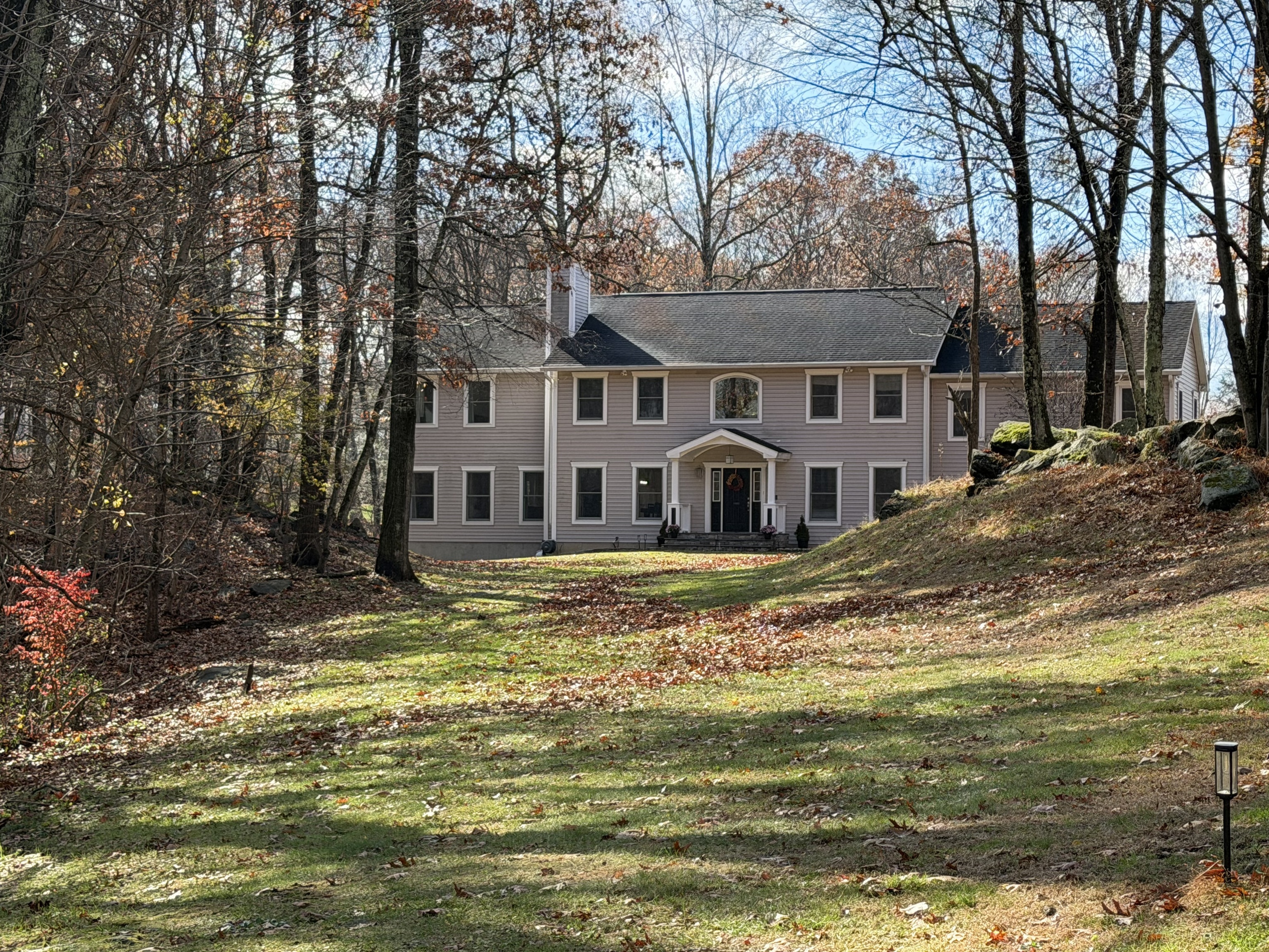 a view of a house with a swimming pool