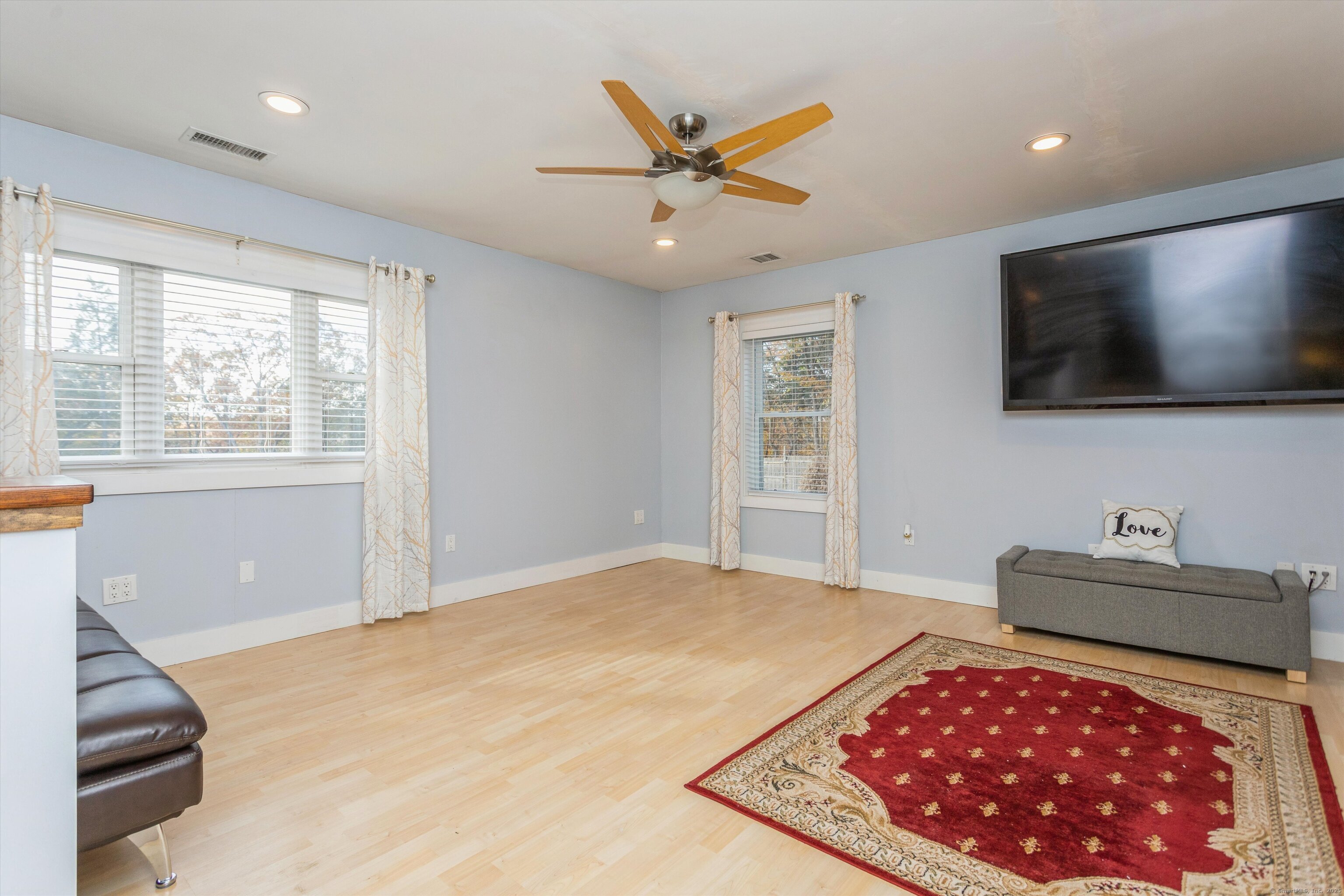1 Rajcula Farm Road Brookfield, CT 06804 - Photo 26 of 40 a bedroom with a bed window and a flat screen tv
