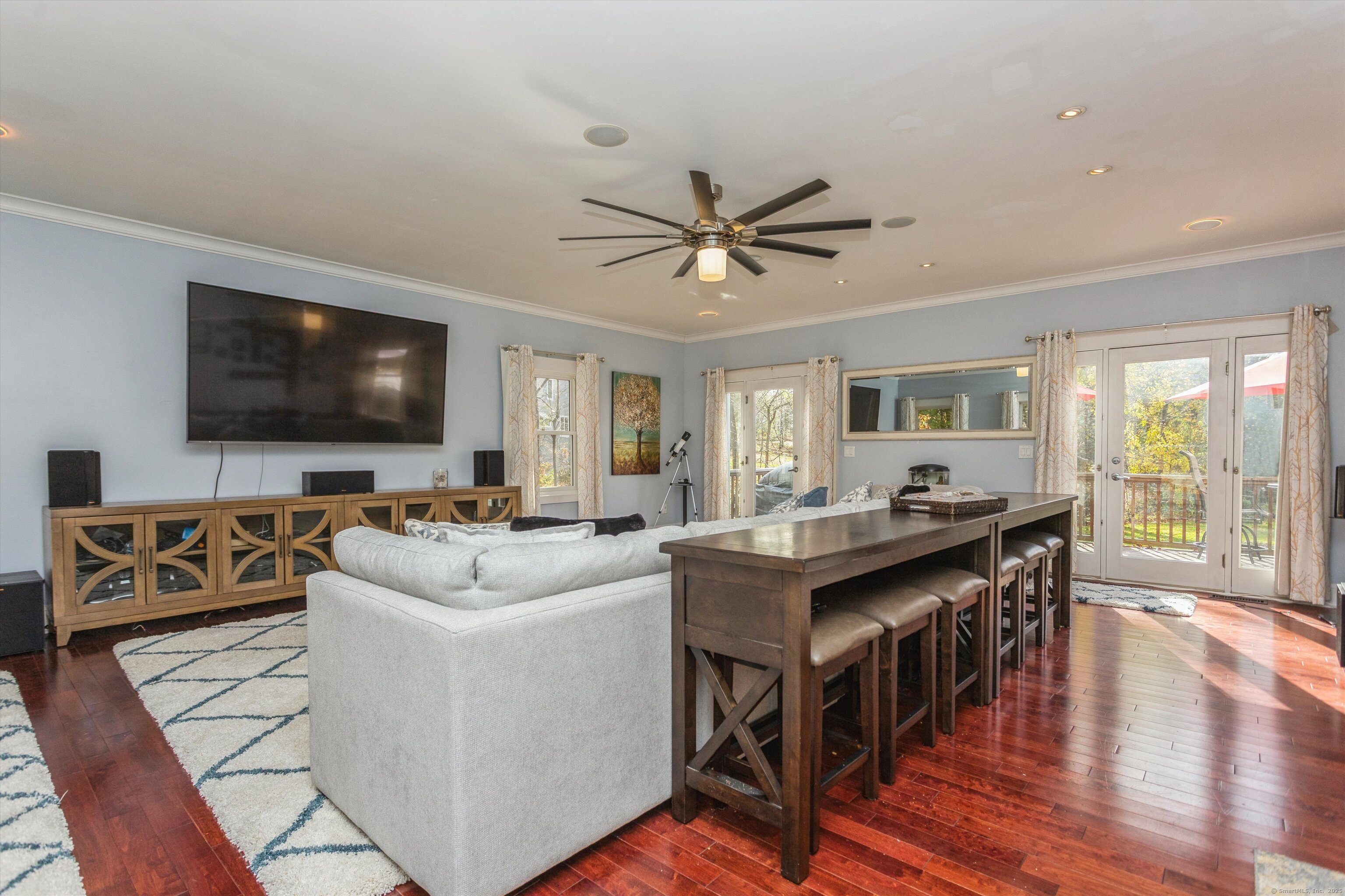 1 Rajcula Farm Road Brookfield, CT 06804 - Photo 5 of 40 a living room with furniture a flat screen tv and a large window