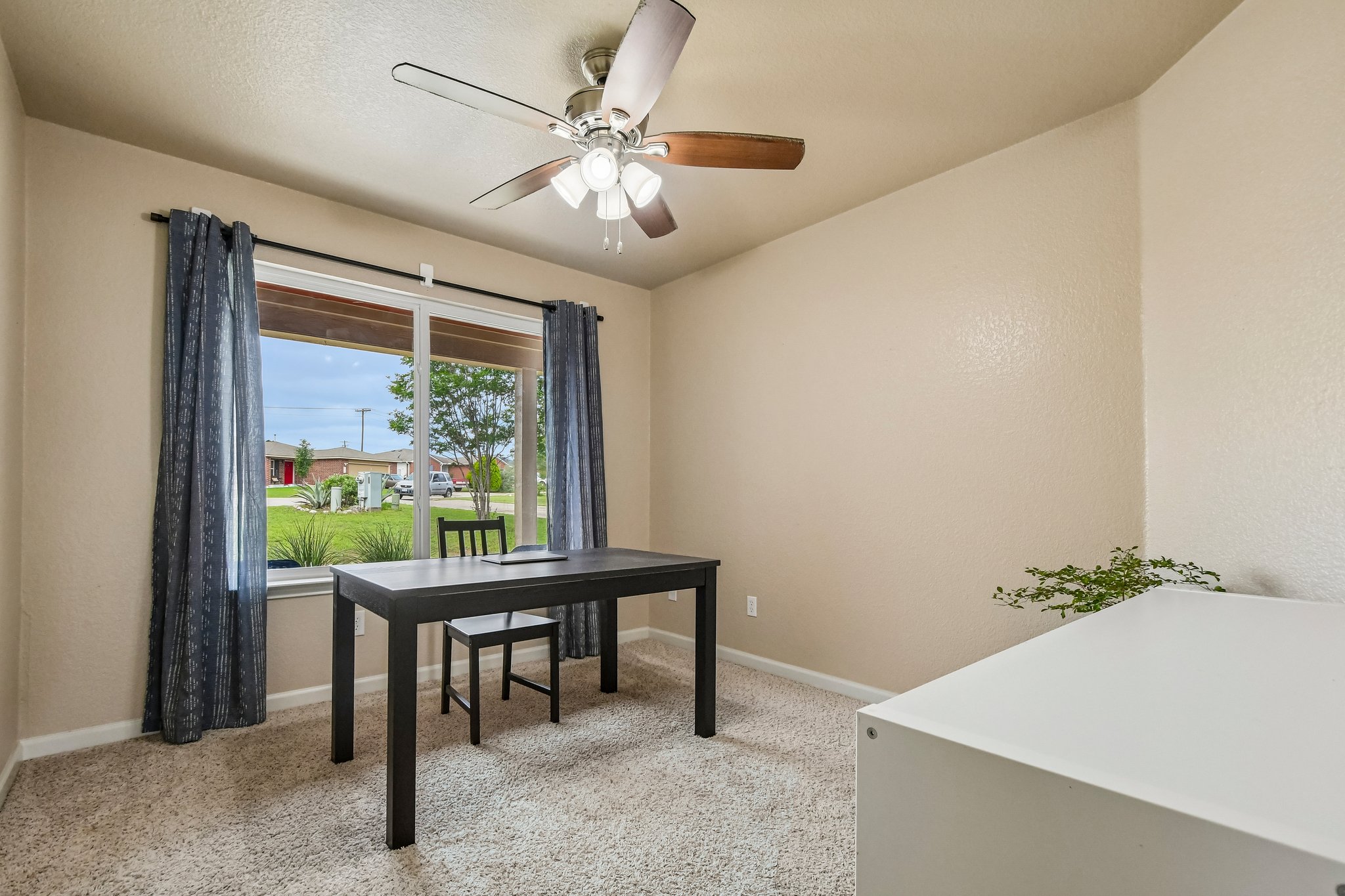 125 Mason Reed Cove Kyle, TX 78640 - Photo 18 of 39 a view of a dining room with furniture window and outside view