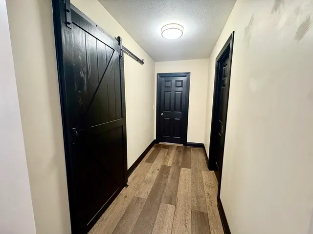 a room with furniture and a flat screen tv