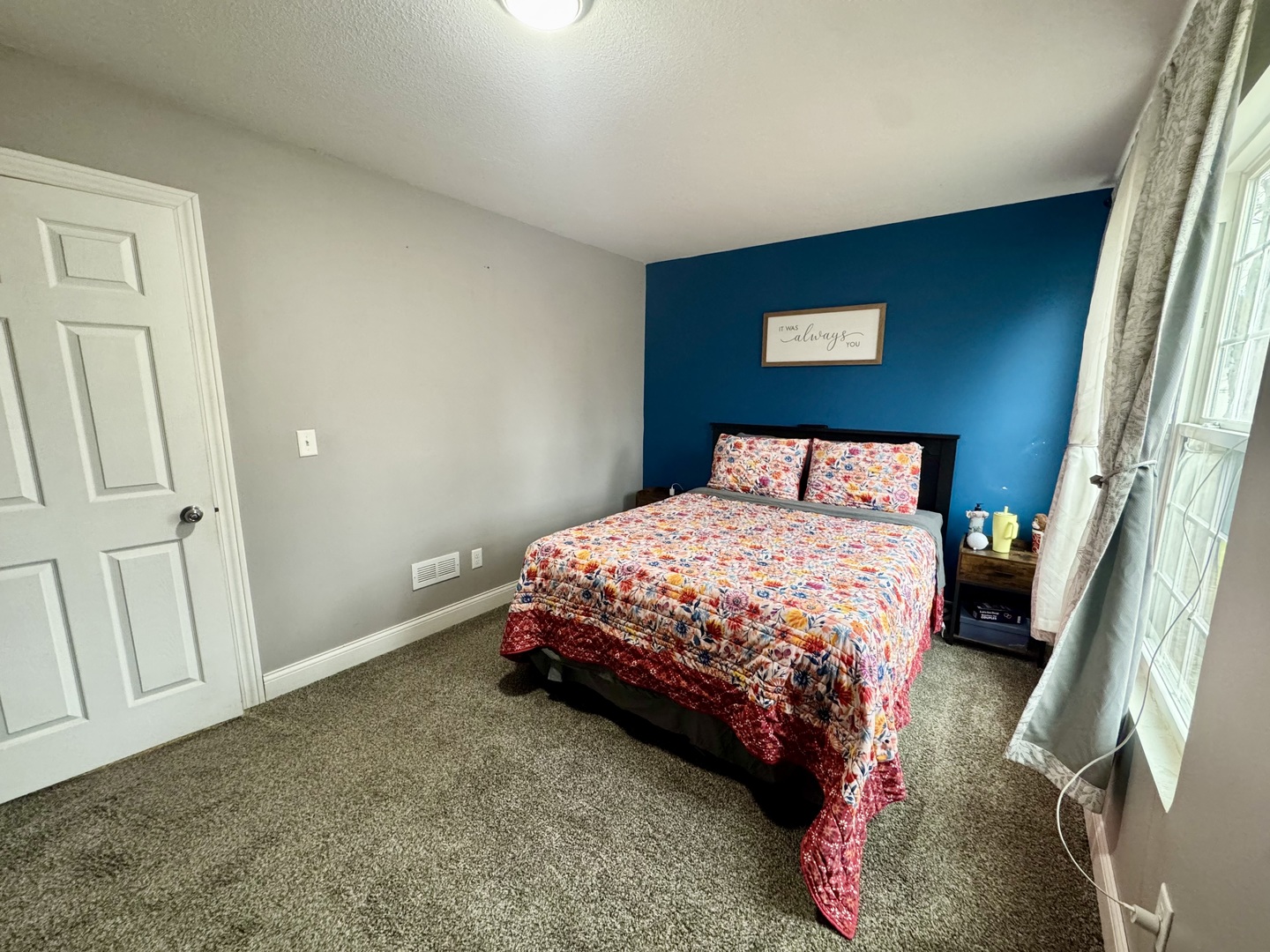 402 North Center Street Colfax, IL 61728 - Photo 17 of 25 a bedroom with a bed and a mirror