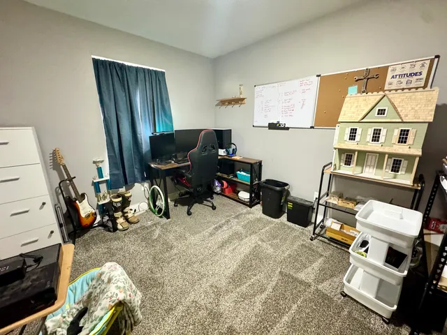 a bedroom with furniture and a bed