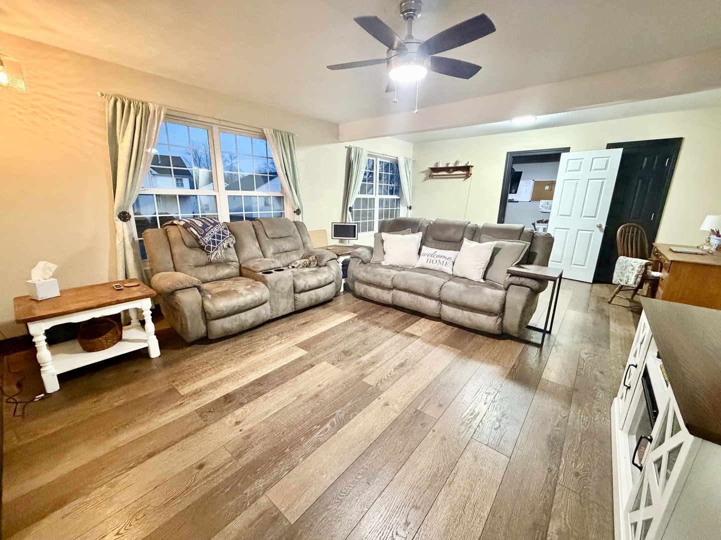 402 North Center Street Colfax, IL 61728 - Photo 10 of 25 a living room with furniture and a wooden floor