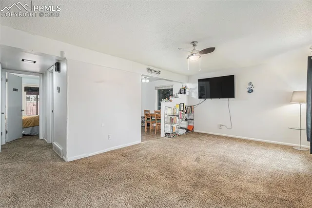 a view of a livingroom with a flat screen tv