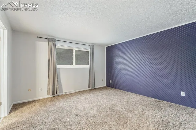 an empty room with closet