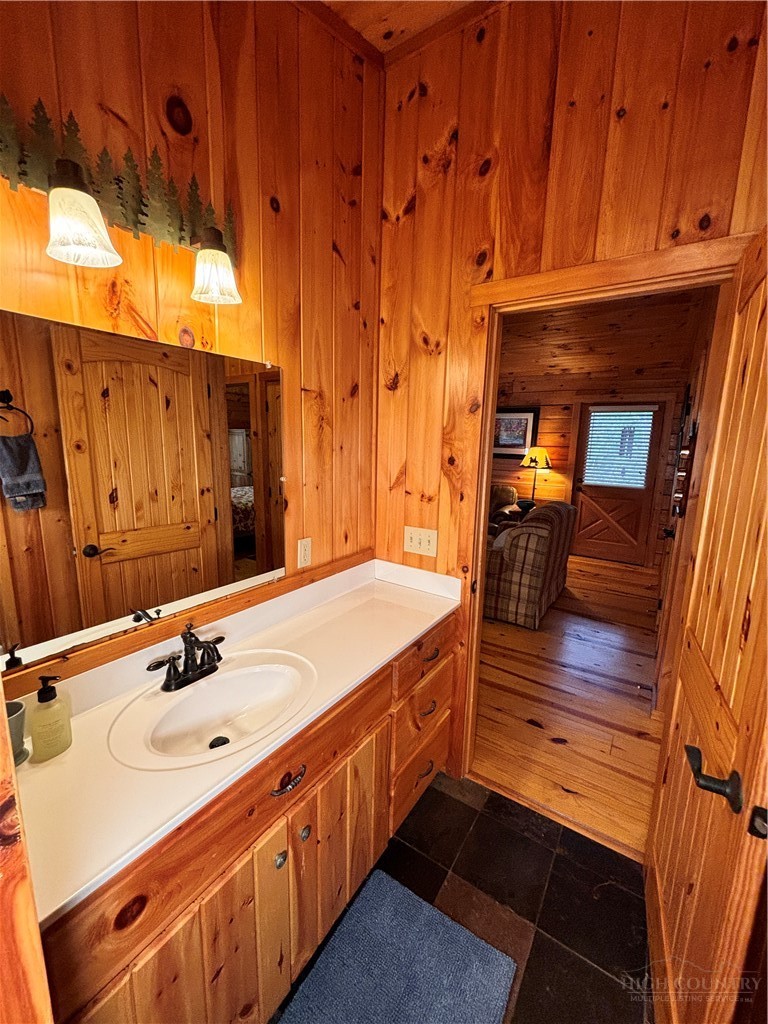 150 Turkey Ridge Crumpler, NC 28617 - Photo 28 of 40 a bathroom with a sink and a mirror