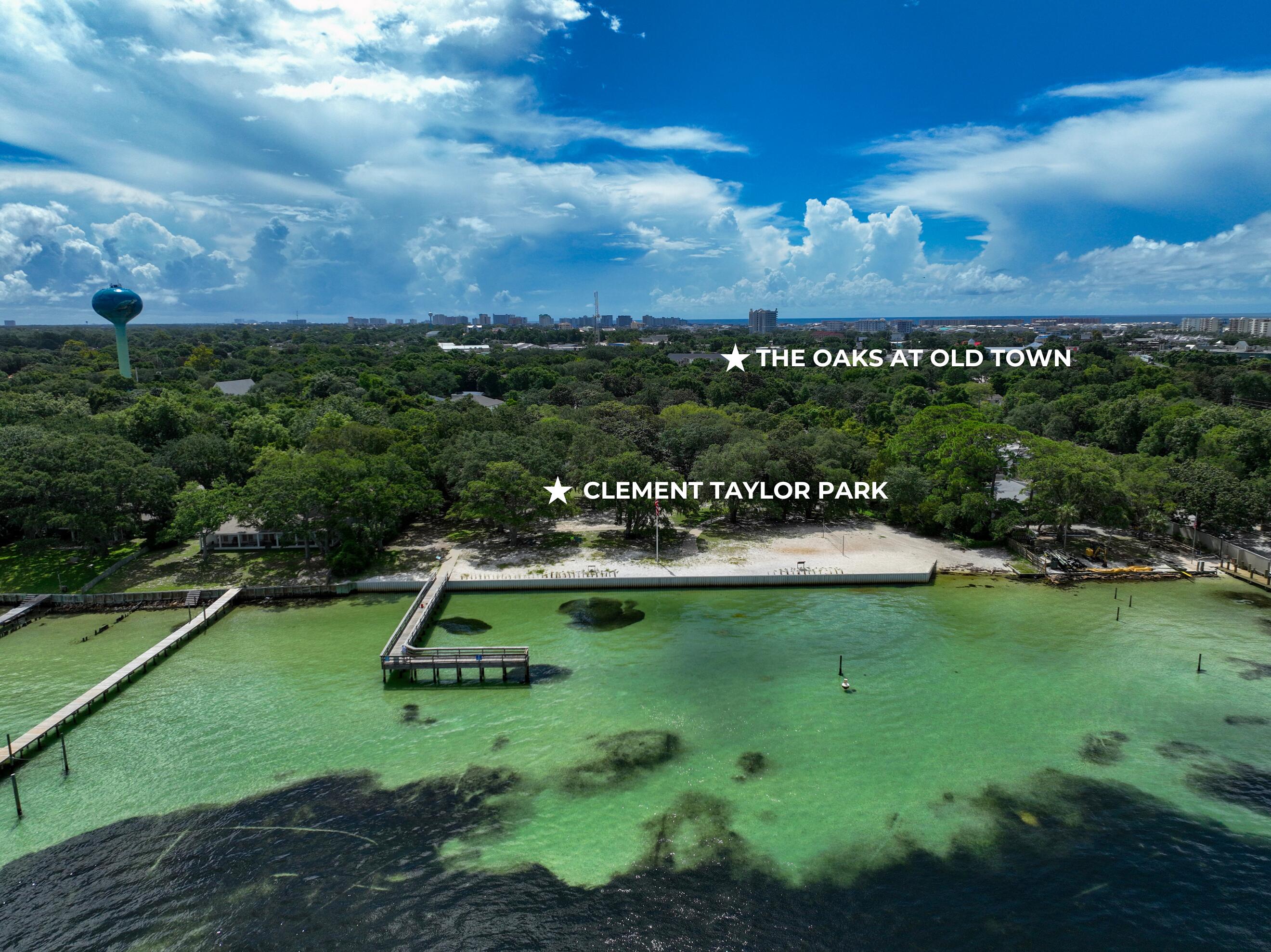 140 Sibert Avenue, Unit 7 Destin, FL 32541 - Photo 33 of 38 a view of a lake with a park