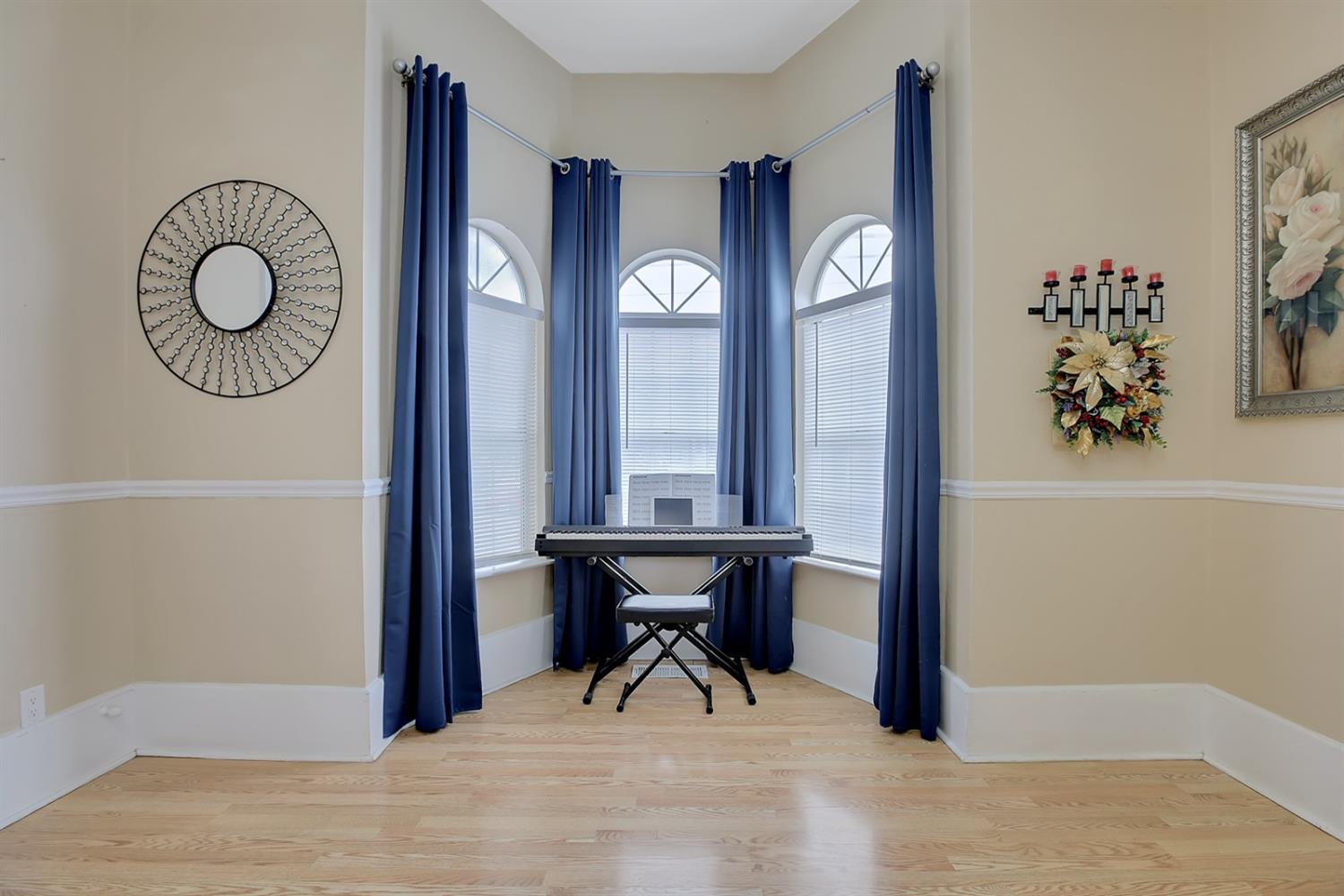 1408 Hazel Street Gridley, CA 95948 - Photo 35 of 60 a view of a hallway with entryway wooden floor and dining table