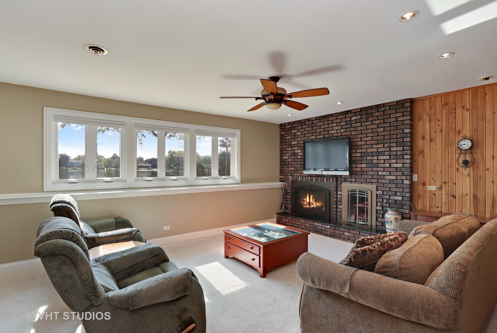 404 Beck Road Lindenhurst, IL 60046 - Photo 12 of 15 a living room with furniture and a fireplace