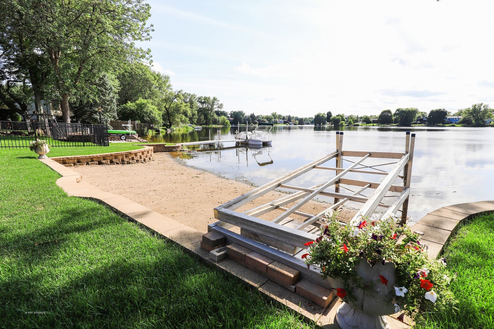 404 Beck Road Lindenhurst, IL 60046 - Photo 13 of 15 a view of a swimming pool with lounge chair on the big yard