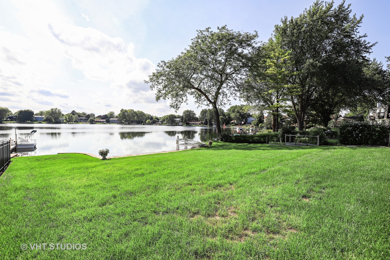 404 Beck Road Lindenhurst, IL 60046 - Photo 15 of 15 a lake view with a big yard and large trees