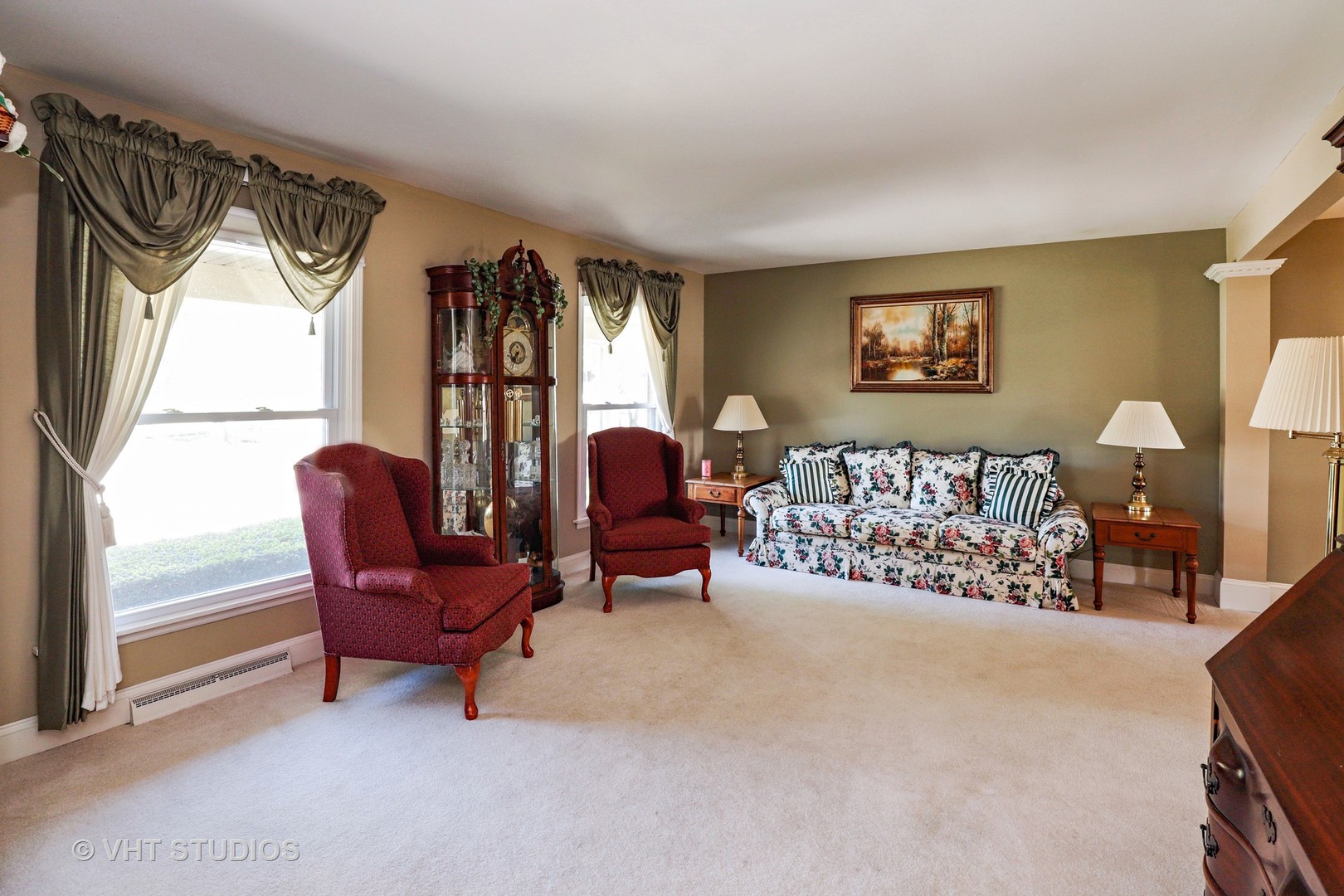 404 Beck Road Lindenhurst, IL 60046 - Photo 4 of 15 a living room with furniture and a large window