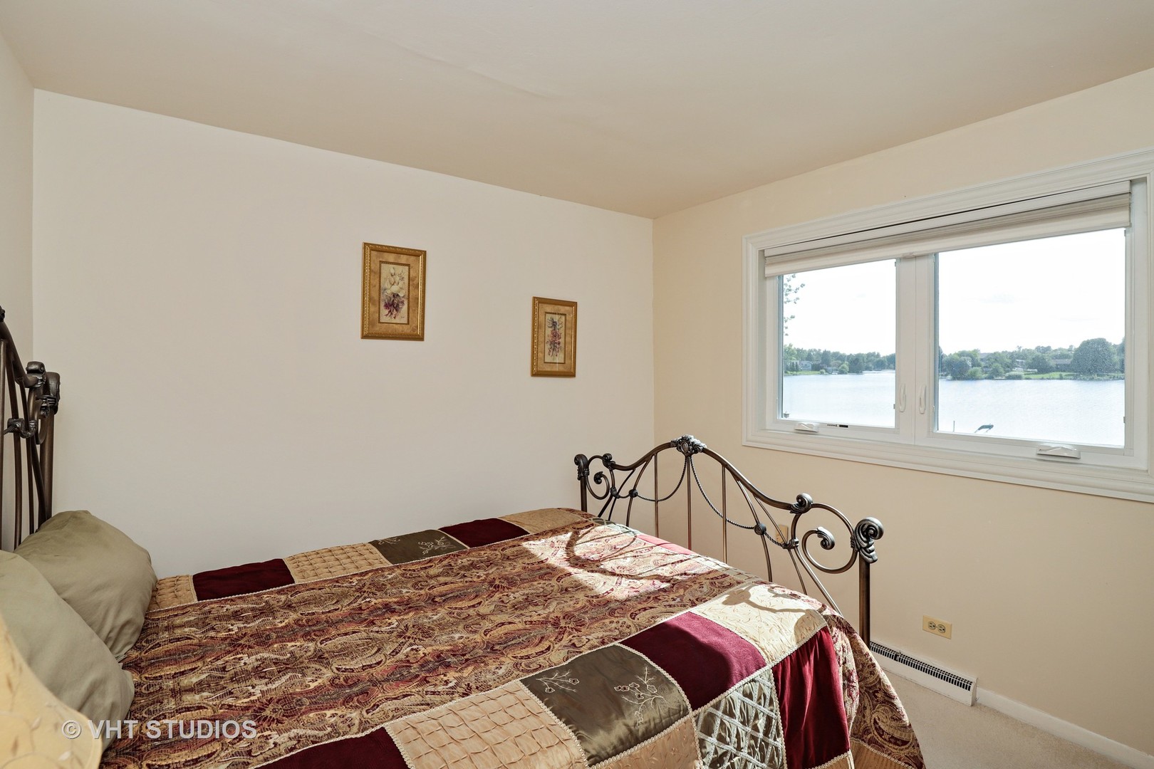 404 Beck Road Lindenhurst, IL 60046 - Photo 8 of 15 a bedroom with a bed and a window