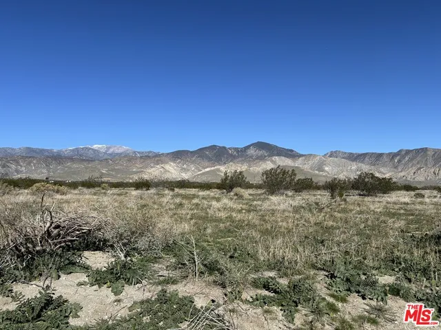 a view of lake with mountain