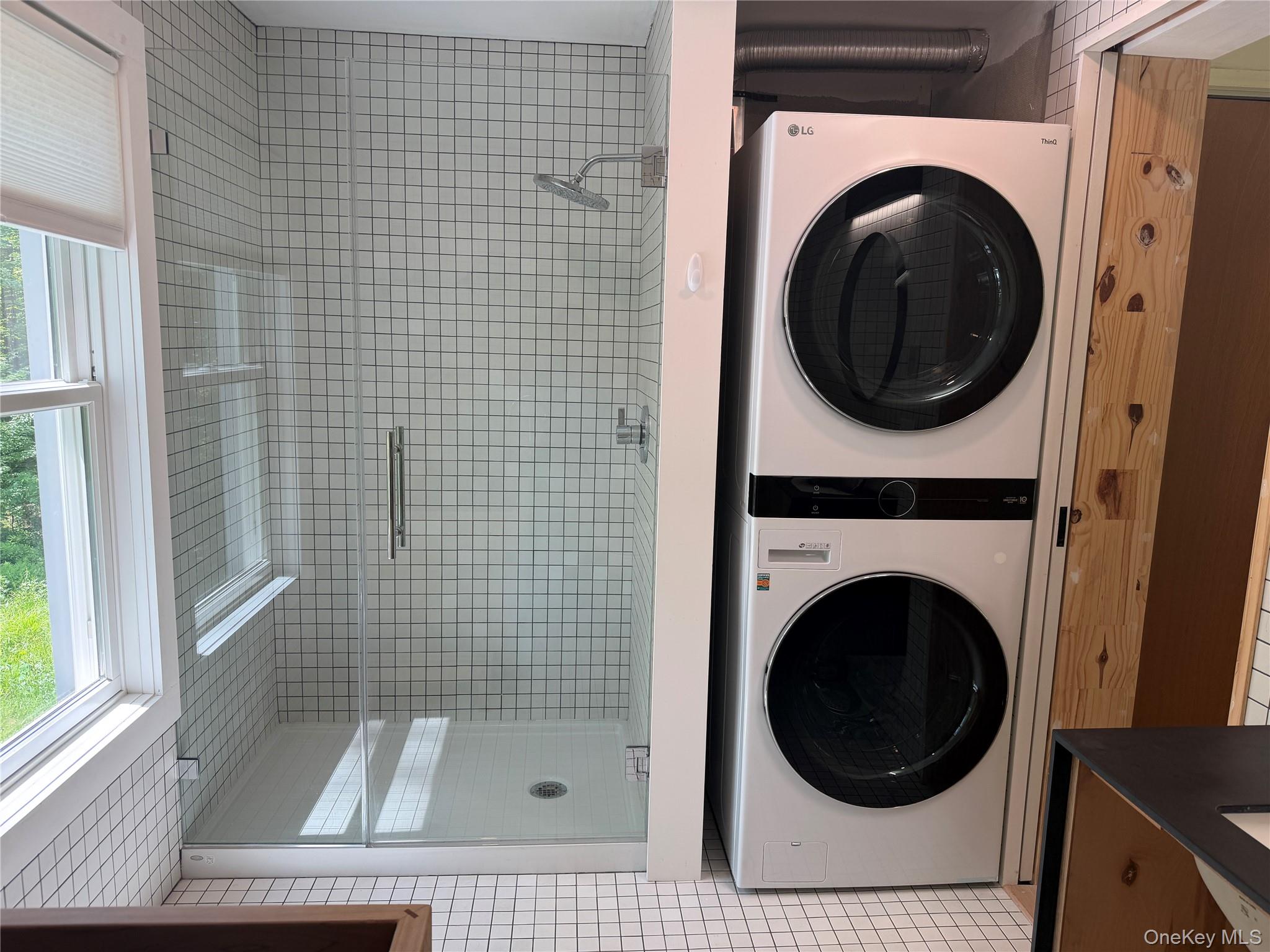 40 Pioneer Road Gardiner, NY 12525 - Photo 12 of 16 a view of a bathroom with a washer and dryer