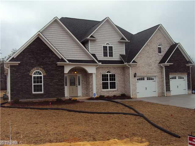 5059 Peppertree Road Clemmons, NC 27012 - Photo 1 of 16 Exterior Front. Beautiful Mousavi Built Home! With Brick Stone and Vinyl exterior!