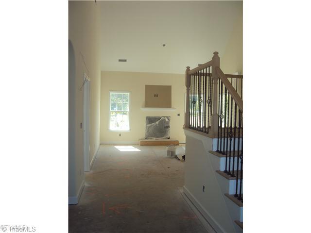 5059 Peppertree Road Clemmons, NC 27012 - Photo 2 of 16 Entry. Vaulted ceilings,beautiful hardwoods with cozy gas fireplace.