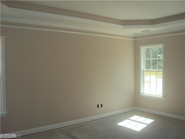 5059 Peppertree Road Clemmons, NC 27012 - Photo 12 of 16 Master Bedroom. Trey ceilings in the oversized Master with Master Spa bath.