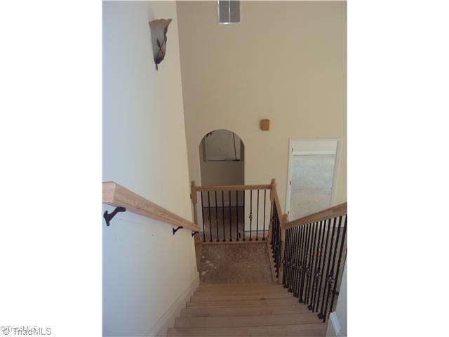 5059 Peppertree Road Clemmons, NC 27012 - Photo 15 of 16 Entry. View from upstairs! Beautiful iron railing!