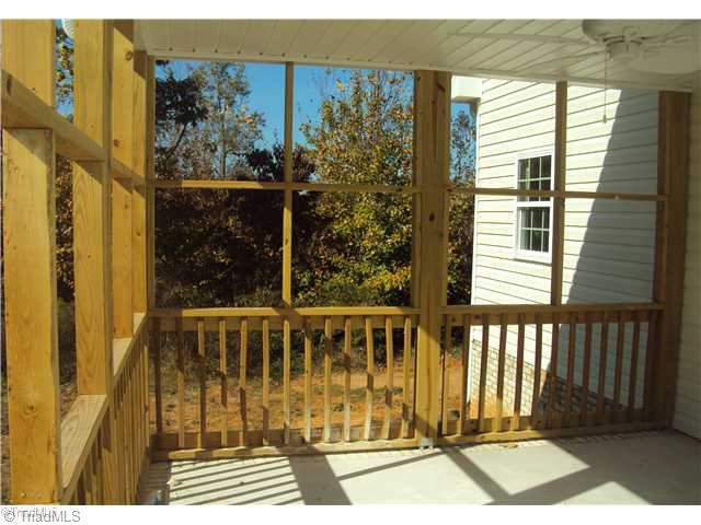5059 Peppertree Road Clemmons, NC 27012 - Photo 16 of 16 Exterior Back. Screened in Porch for those mild weather nights!