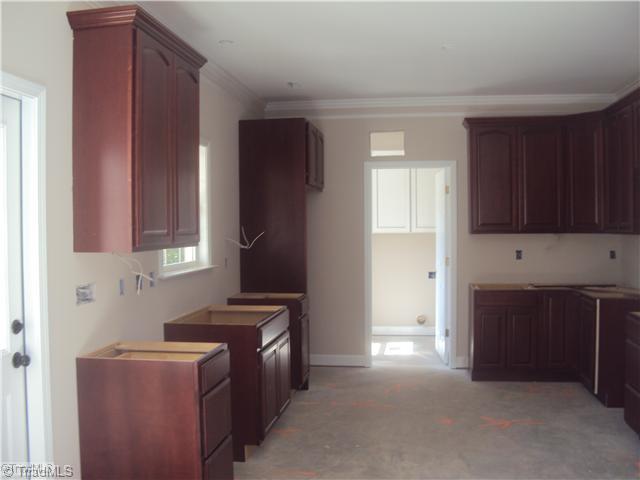 5059 Peppertree Road Clemmons, NC 27012 - Photo 3 of 16 Kitchen. Large kitchen with Craftsman cabinets,Tile and granite!