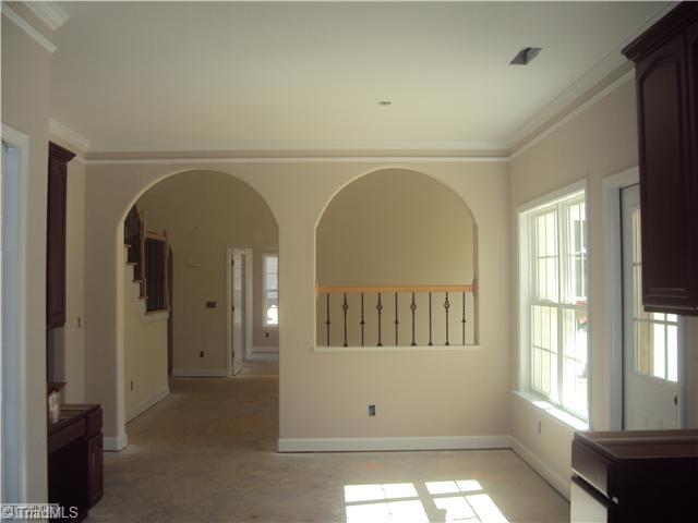 5059 Peppertree Road Clemmons, NC 27012 - Photo 6 of 16 Kitchen. Arched doorways through out. Nice size breakfast nook.