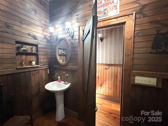 a bathroom with a sink and a window