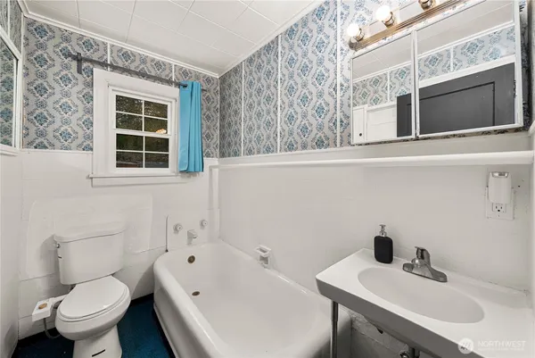 a bathroom with a sink and a toilet