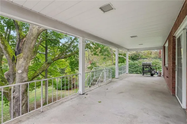 a view of backyard with green space