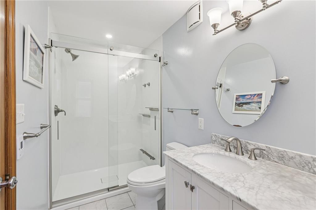 12 Holland Road Pittsburgh, PA 15235 - Photo 22 of 49 a bathroom with a granite countertop sink toilet and shower