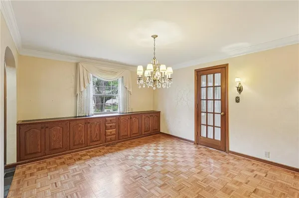 a view of a bedroom with windows