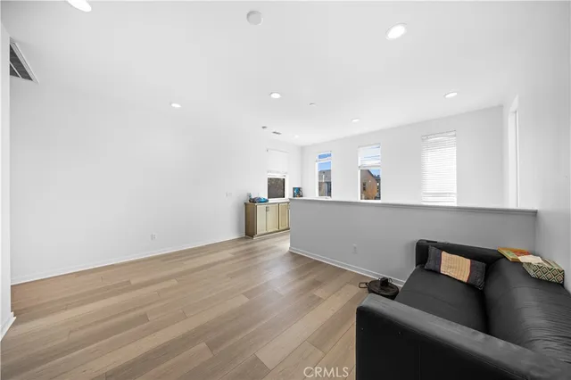 a bathroom with a sink double vanity granite tub and a mirror