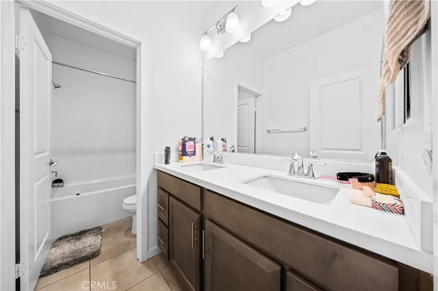 a bathroom with a toilet and a bathtub