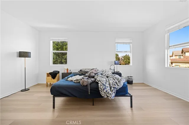 a large bathroom with a double vanity sink mirror and bathtub