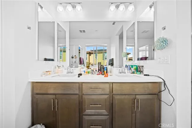 a bedroom with bed and window