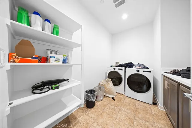 a bedroom with a bed and furniture