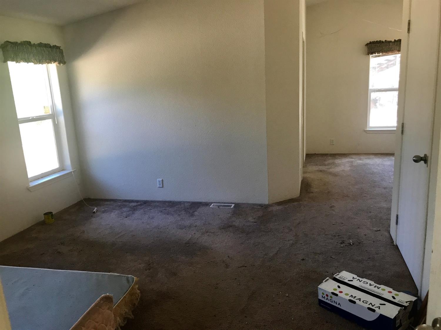 435 Janice Way Merlin, OR 97532 - Photo 8 of 12 an empty room with windows