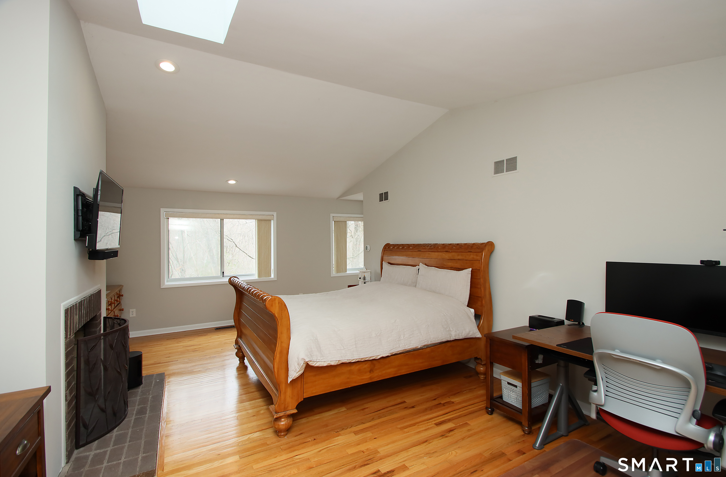 78 Sturbridge Road Easton, CT 06612 - Photo 18 of 35 a bedroom with a bed and wooden floor