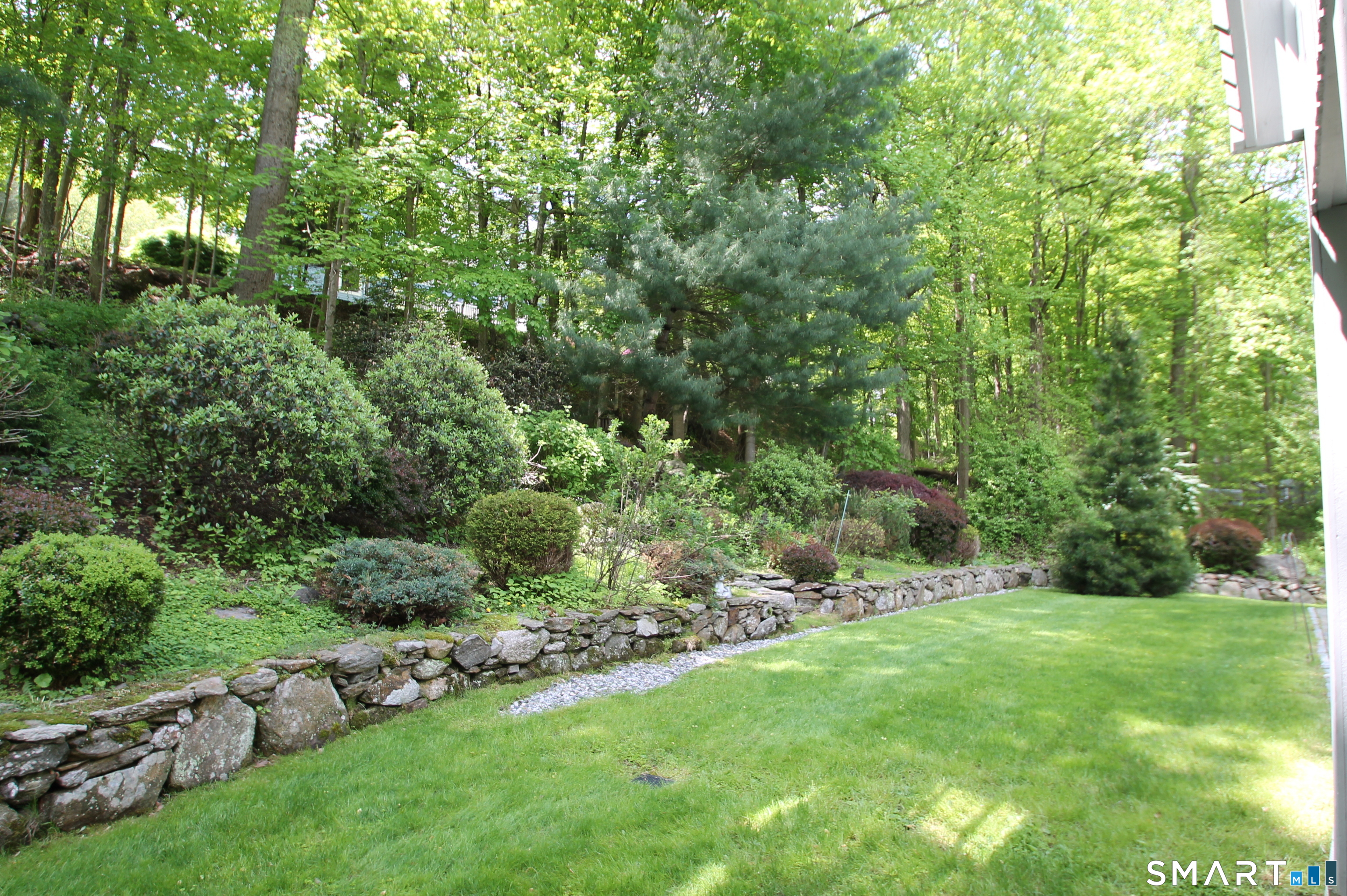 78 Sturbridge Road Easton, CT 06612 - Photo 2 of 35 a view of green field with trees in the background