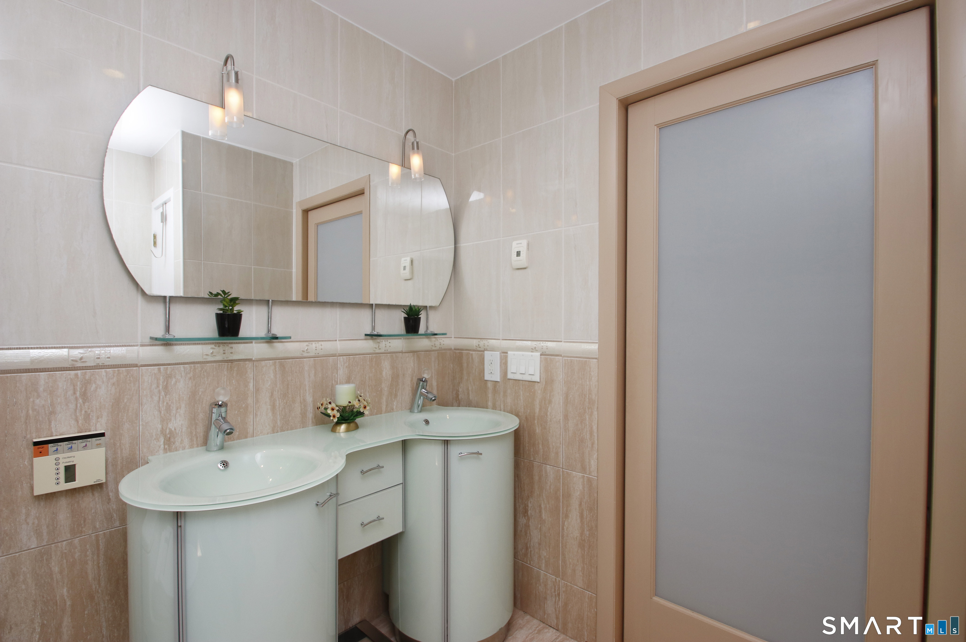 78 Sturbridge Road Easton, CT 06612 - Photo 22 of 35 a bathroom with a sink and a mirror