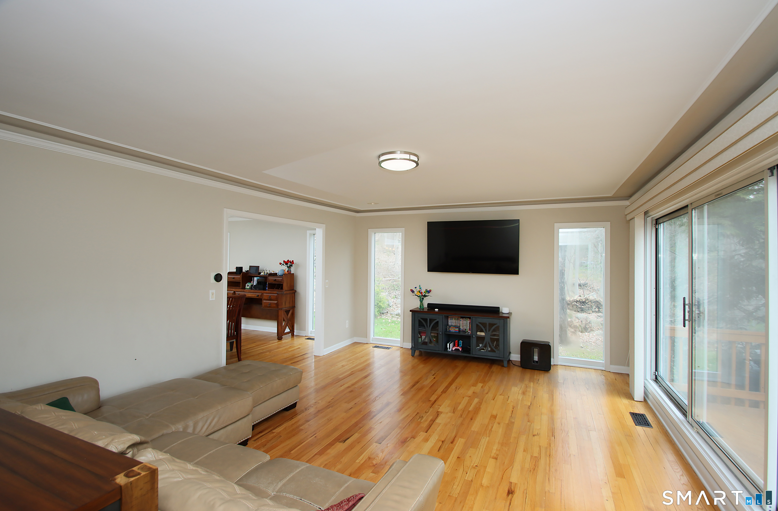 78 Sturbridge Road Easton, CT 06612 - Photo 5 of 35 a living room with furniture and a flat screen tv