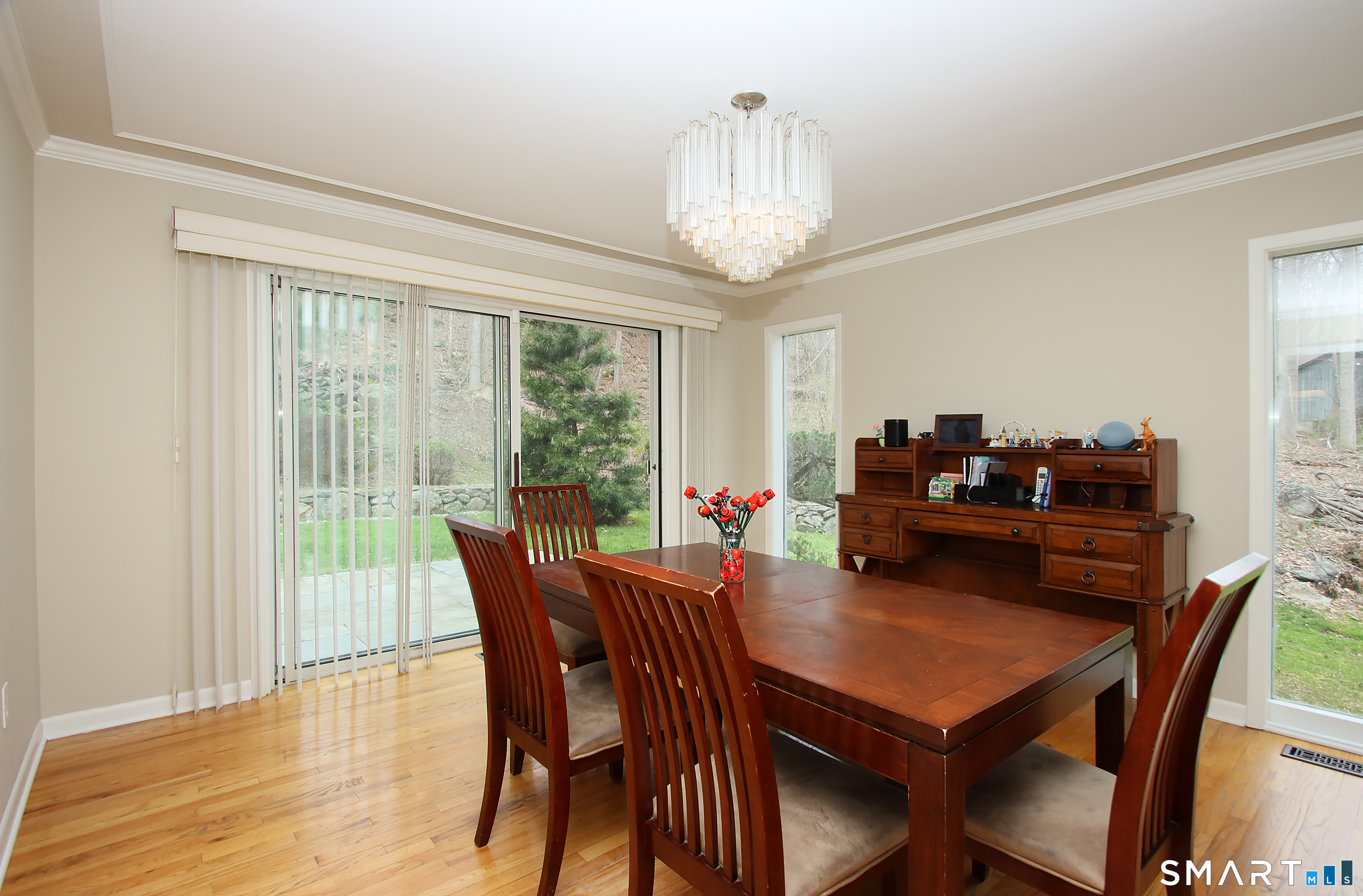 78 Sturbridge Road Easton, CT 06612 - Photo 8 of 35 a view of a dining room with furniture wooden floor and chandelier